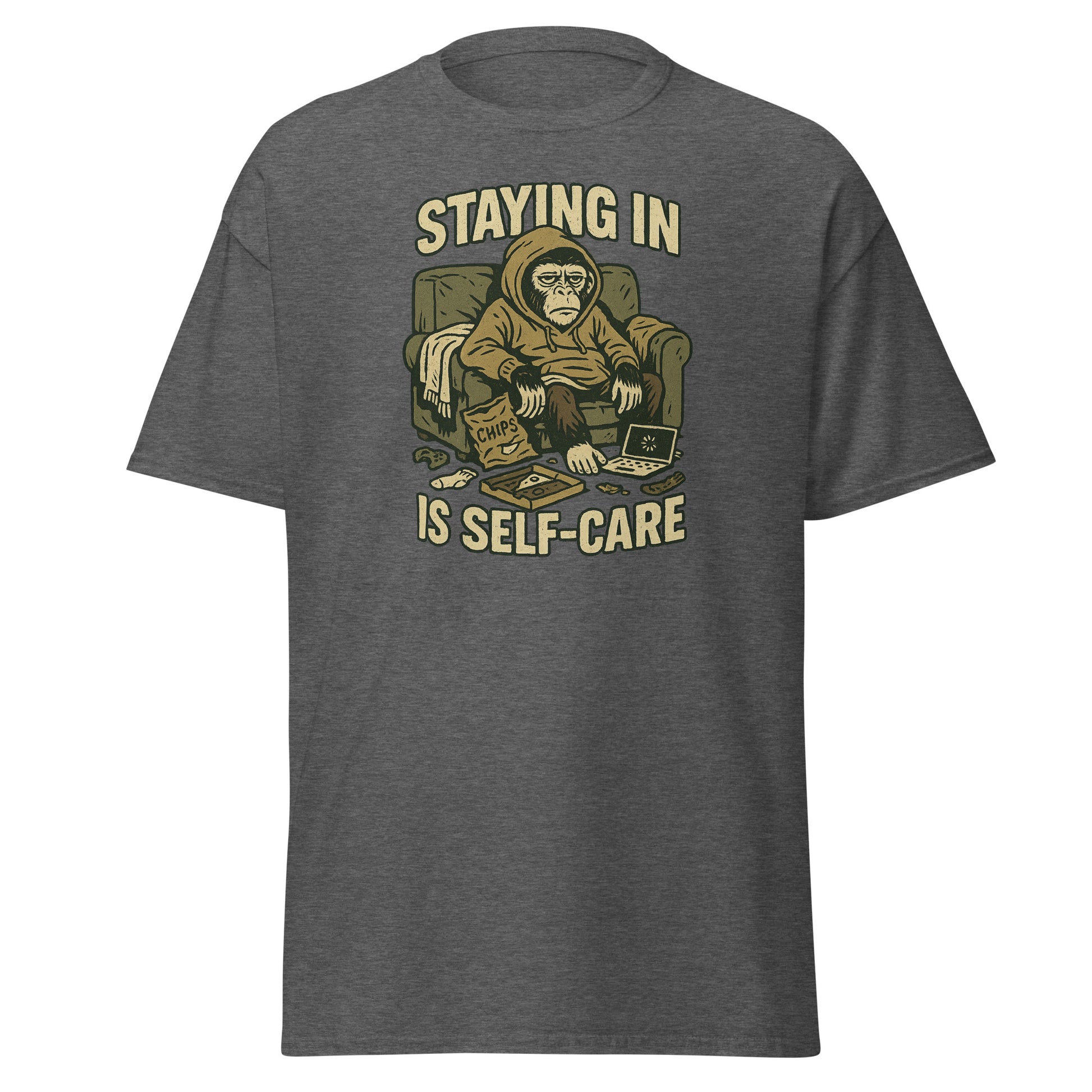 Gray t-shirt with a graphic of a monkey in a chair and text 'STAYING IN IS SELF-CARE' on a white background.