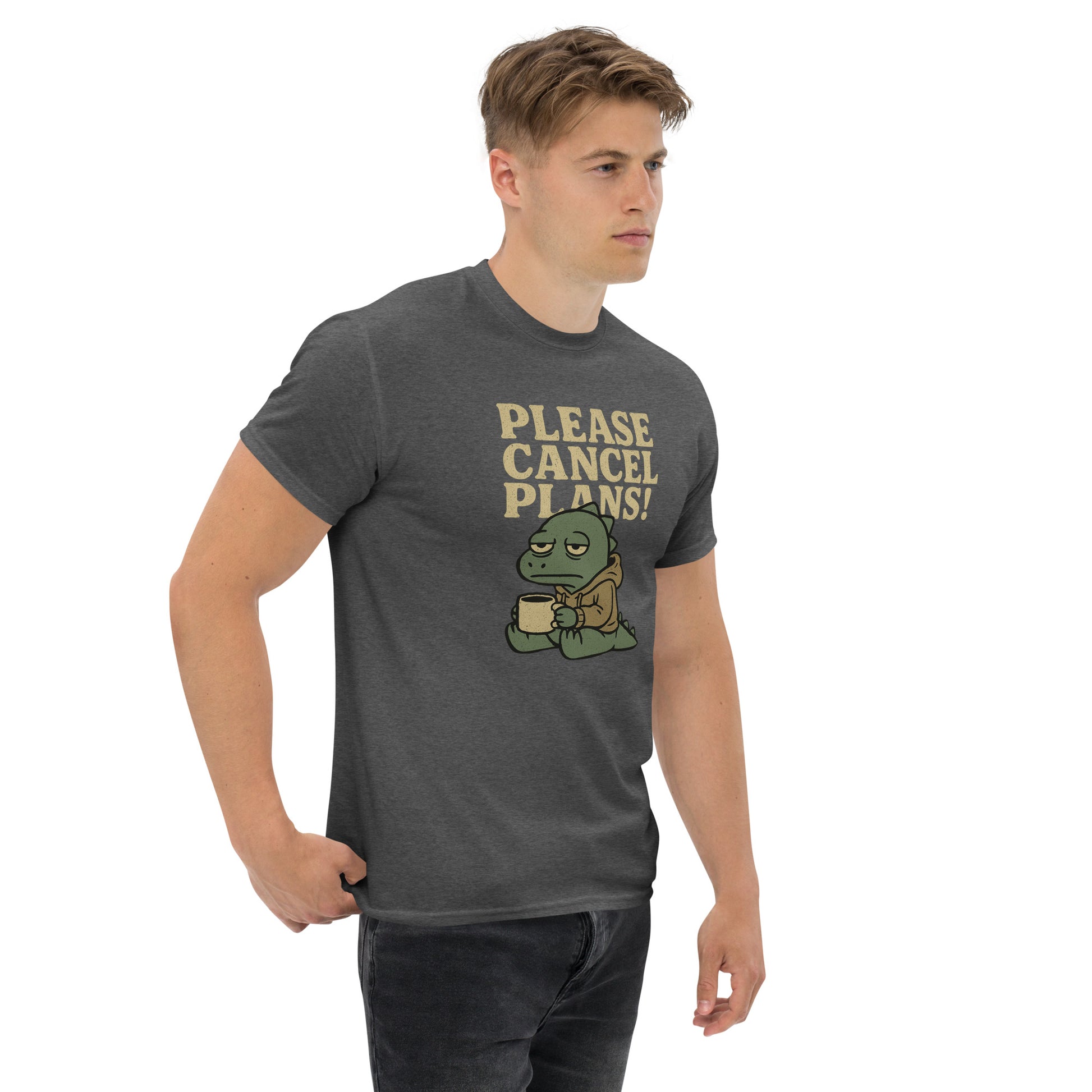 Man wearing a dark gray t-shirt with a graphic and text 'Please Cancel Plans!' on a white background
