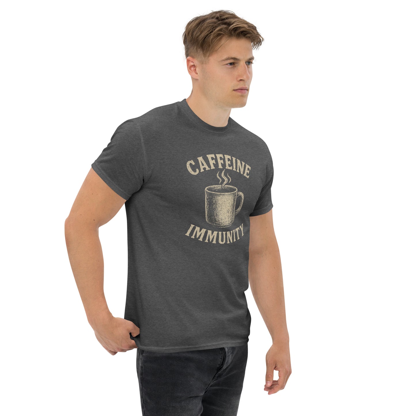 Man wearing a dark gray t-shirt with 'CAFFEINE IMMUNITY' graphic design on a white background