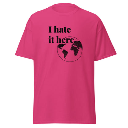 Pink t-shirt with black text and world map graphic on a white background