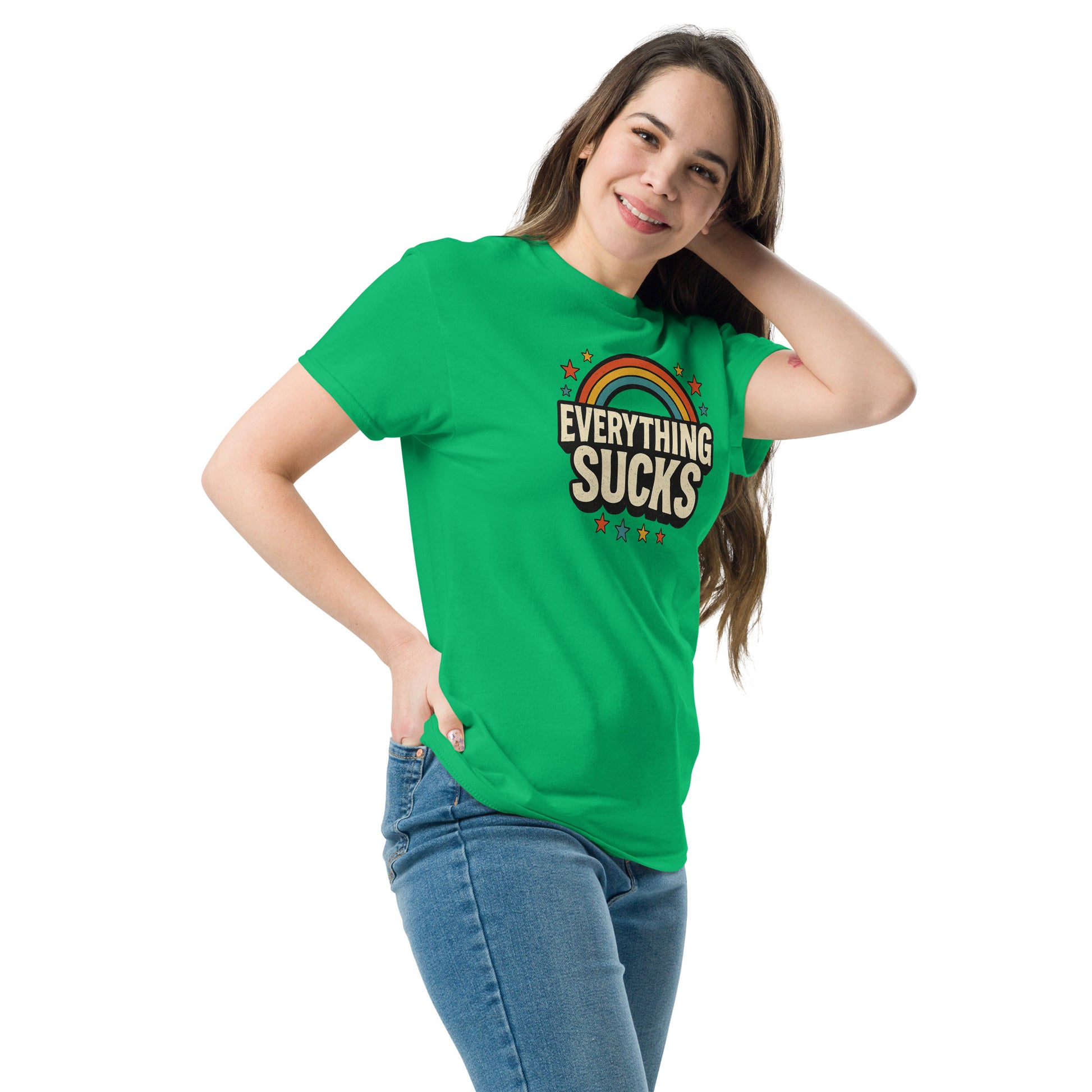Person wearing a green t-shirt with 'Everything Sucks' text and rainbow design on a white background