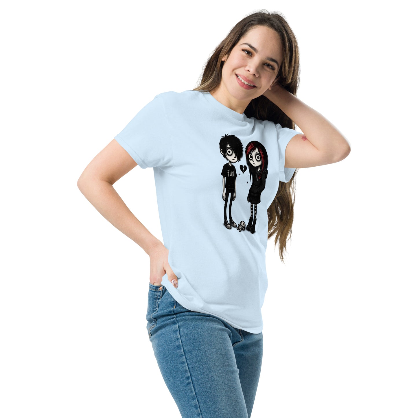 Woman wearing a light blue t-shirt with cartoon characters on a white background