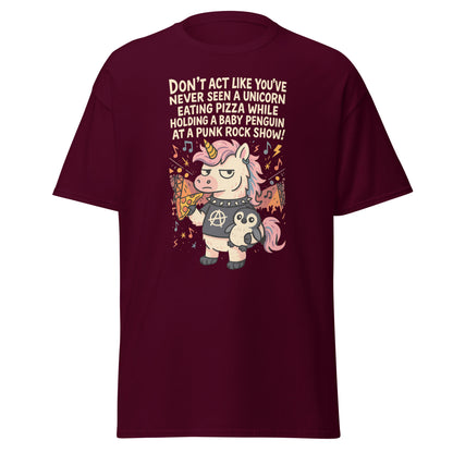 Maroon t-shirt with a unicorn and penguin graphic and humorous text on a white background