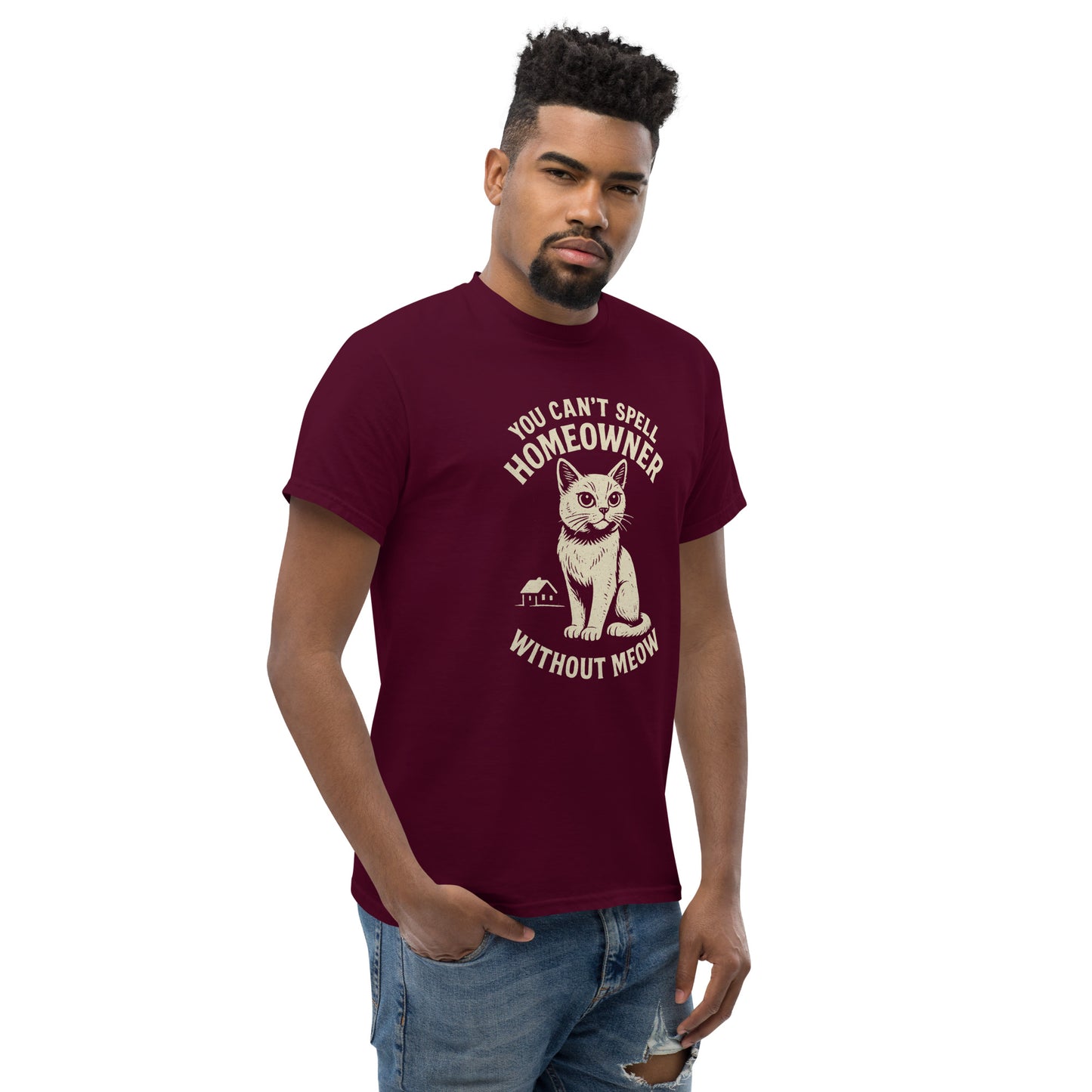 Man wearing a maroon t-shirt with a cat graphic and text on a white background