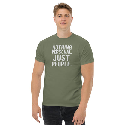 Person wearing a green t-shirt with 'Nothing Personal. Just People.' text on a white background