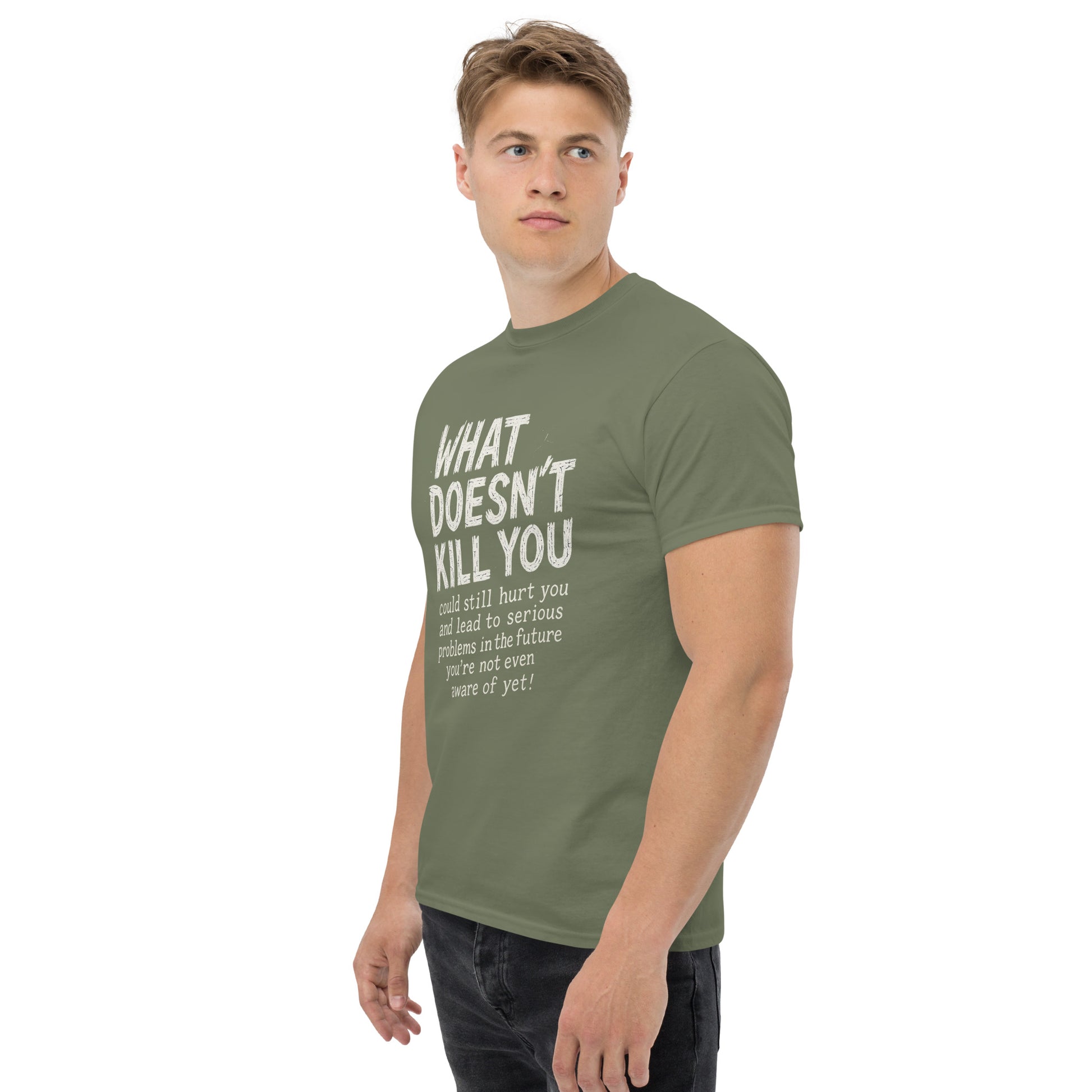 Man wearing a green t-shirt with text on a white background