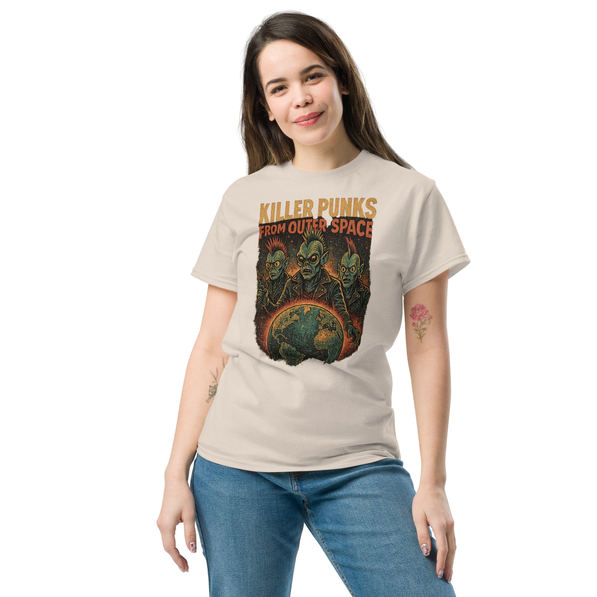 woman wearing cream shirt with alien punks and the earth with the text "Killer punks from outer space" on white background