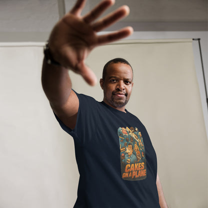 Man wearing a black t-shirt with a graphic design, standing against a plain background