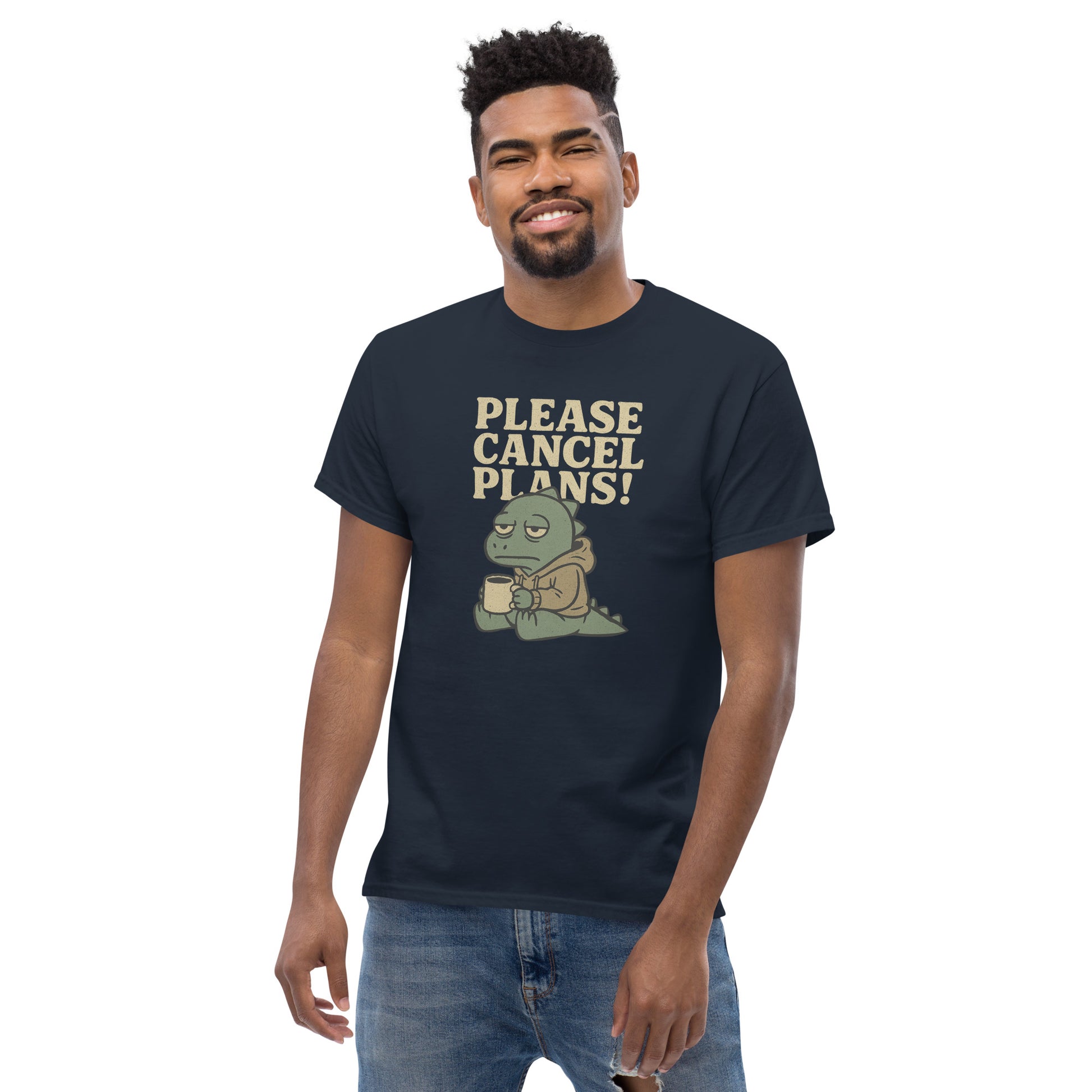 Man wearing a black t-shirt with a graphic and text 'Please Cancel Plans!' on a white background