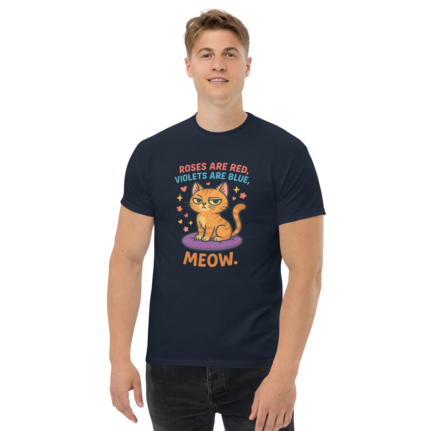 Person wearing a navy blue t-shirt with a cat graphic and text on a white background