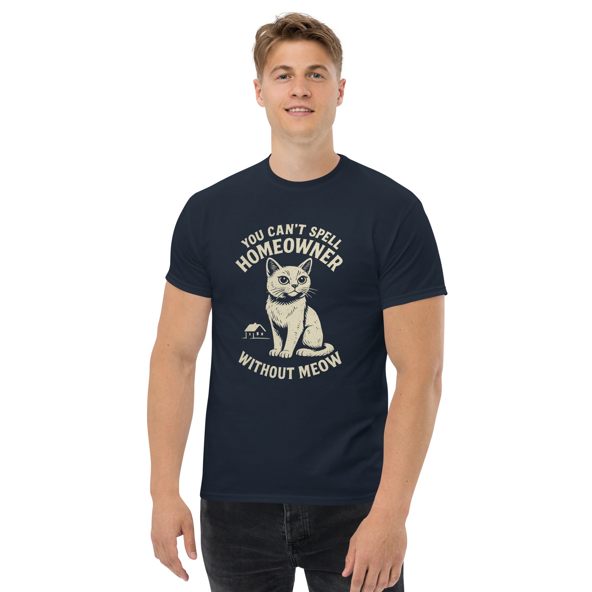 Man wearing a navy blue t-shirt with a cat graphic and text on a white background