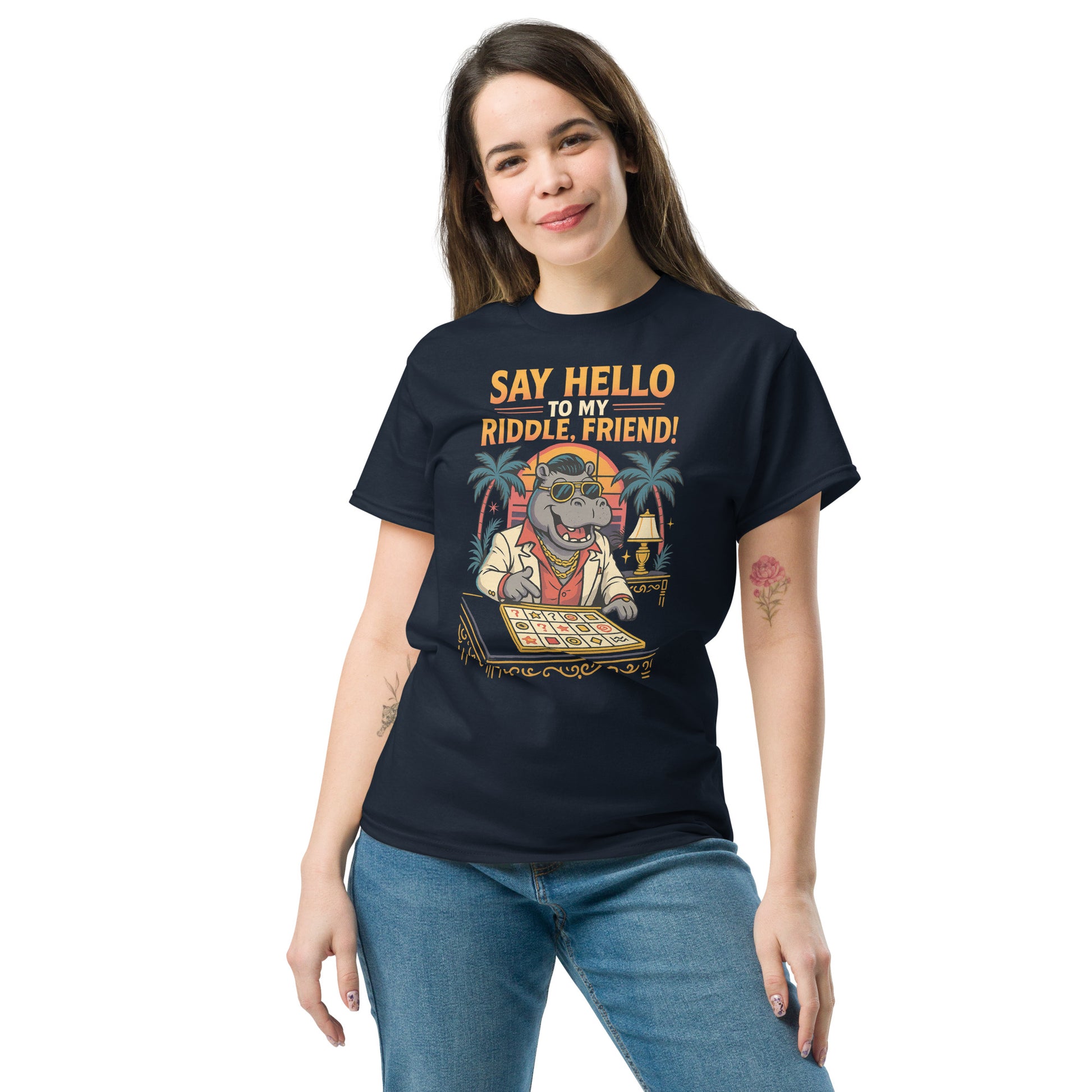woman wearing navy blue shirt with hippo playing a game and text "Say hello to my riddle, friend!"