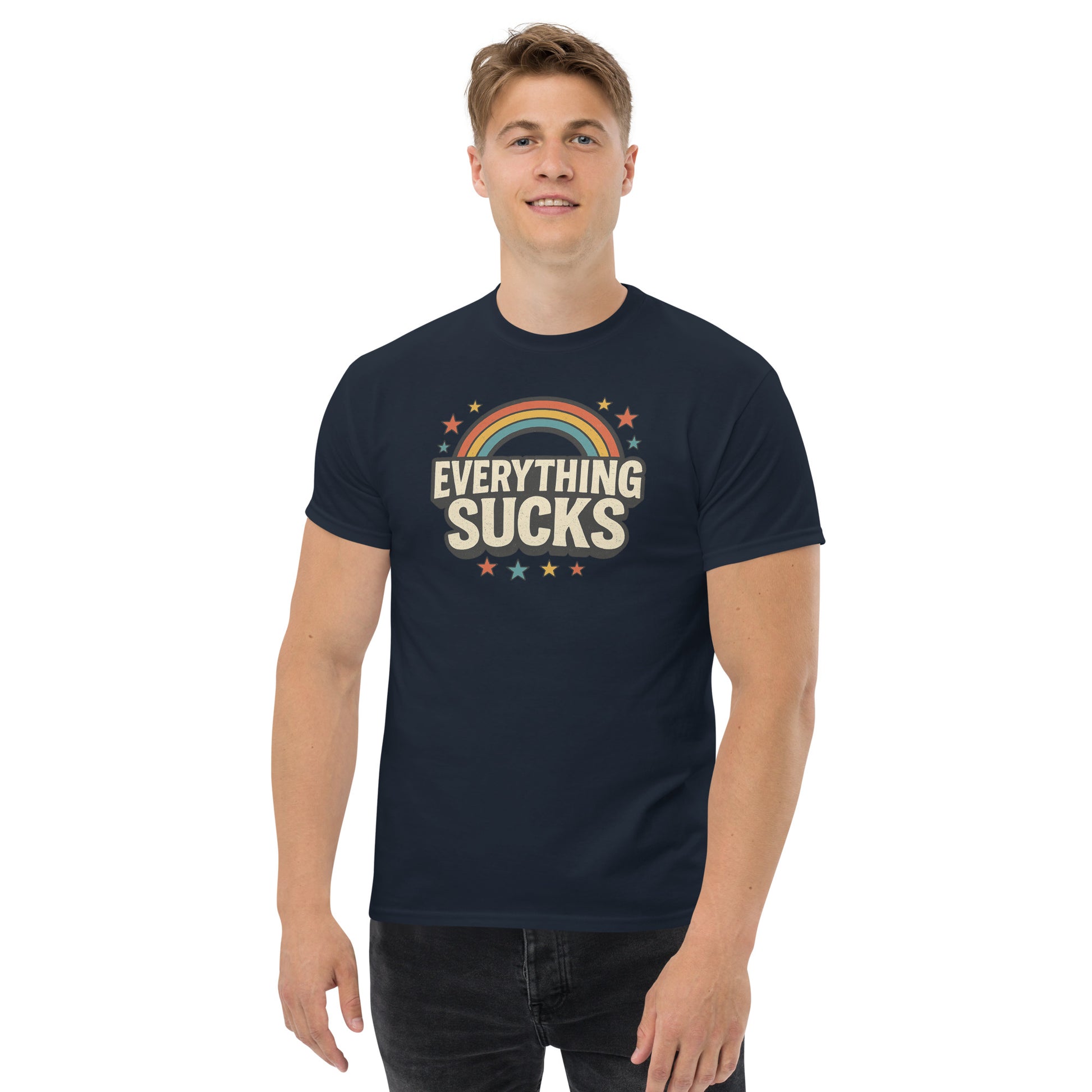 Person wearing a navy blue t-shirt with 'Everything Sucks' graphic design on a white background