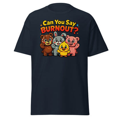 A navy blue short-sleeve t-shirt with a colorful graphic on the chest. The graphic features the text 'Can You Say BURNOUT?' in yellow and red lettering above four cartoon animals—a brown bear, a gray rabbit, a yellow chick, and a pink pig—standing together.