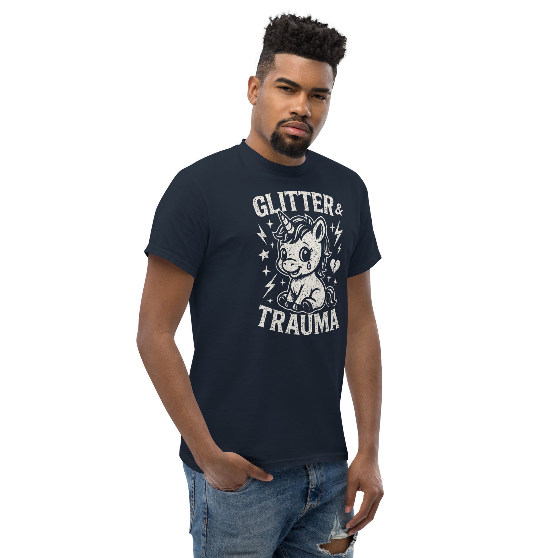 Man wearing a black t-shirt with 'GLITTER & TRAUMA' graphic design on a white background