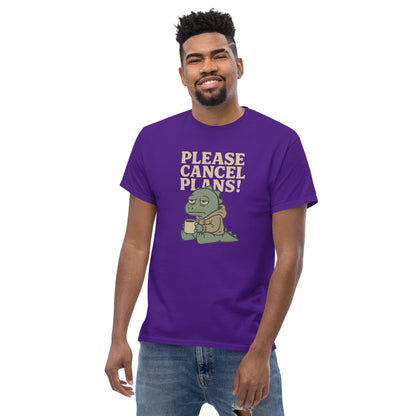 Man wearing a purple t-shirt with a graphic and text 'Please Cancel Plans!' on a white background