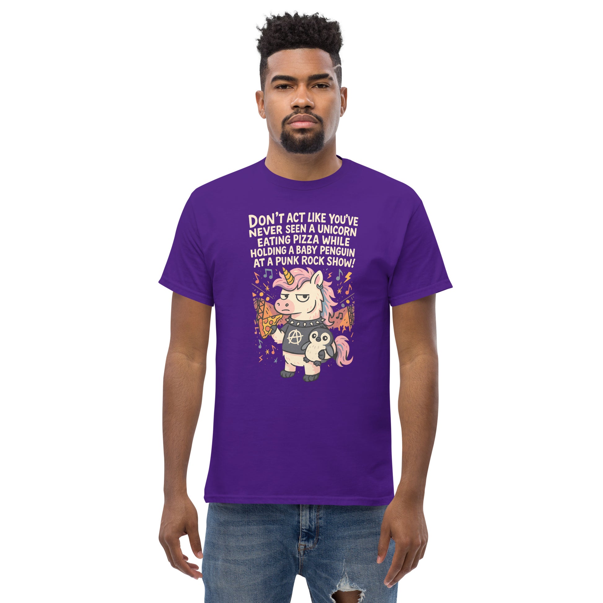 Man wearing a purple t-shirt with a unicorn graphic and text on a white background