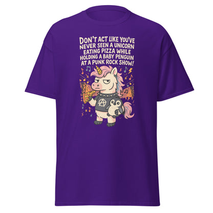 Purple t-shirt with a unicorn and penguin graphic and humorous text on a white background
