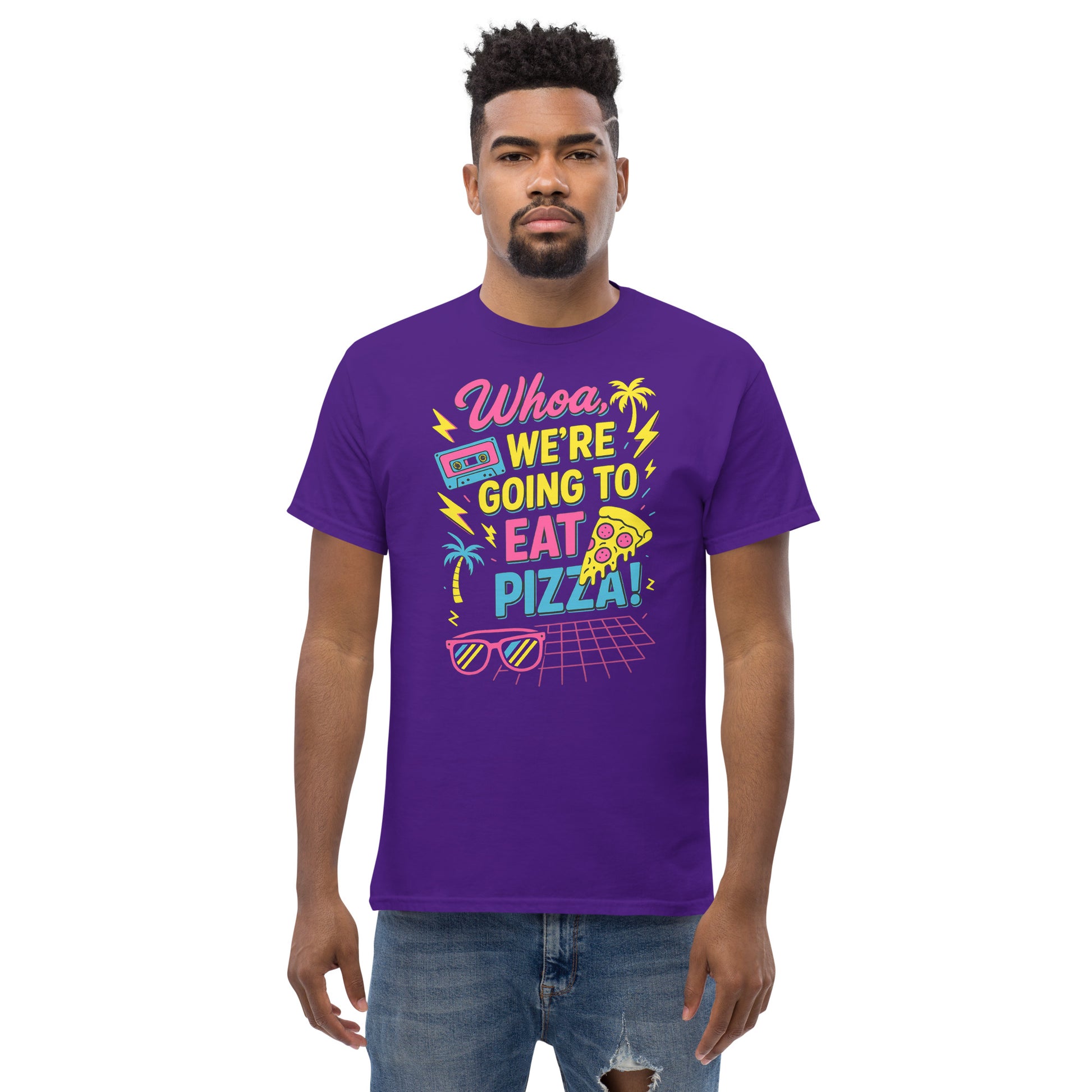 Man wearing a purple t-shirt with colorful text and graphics on a white background