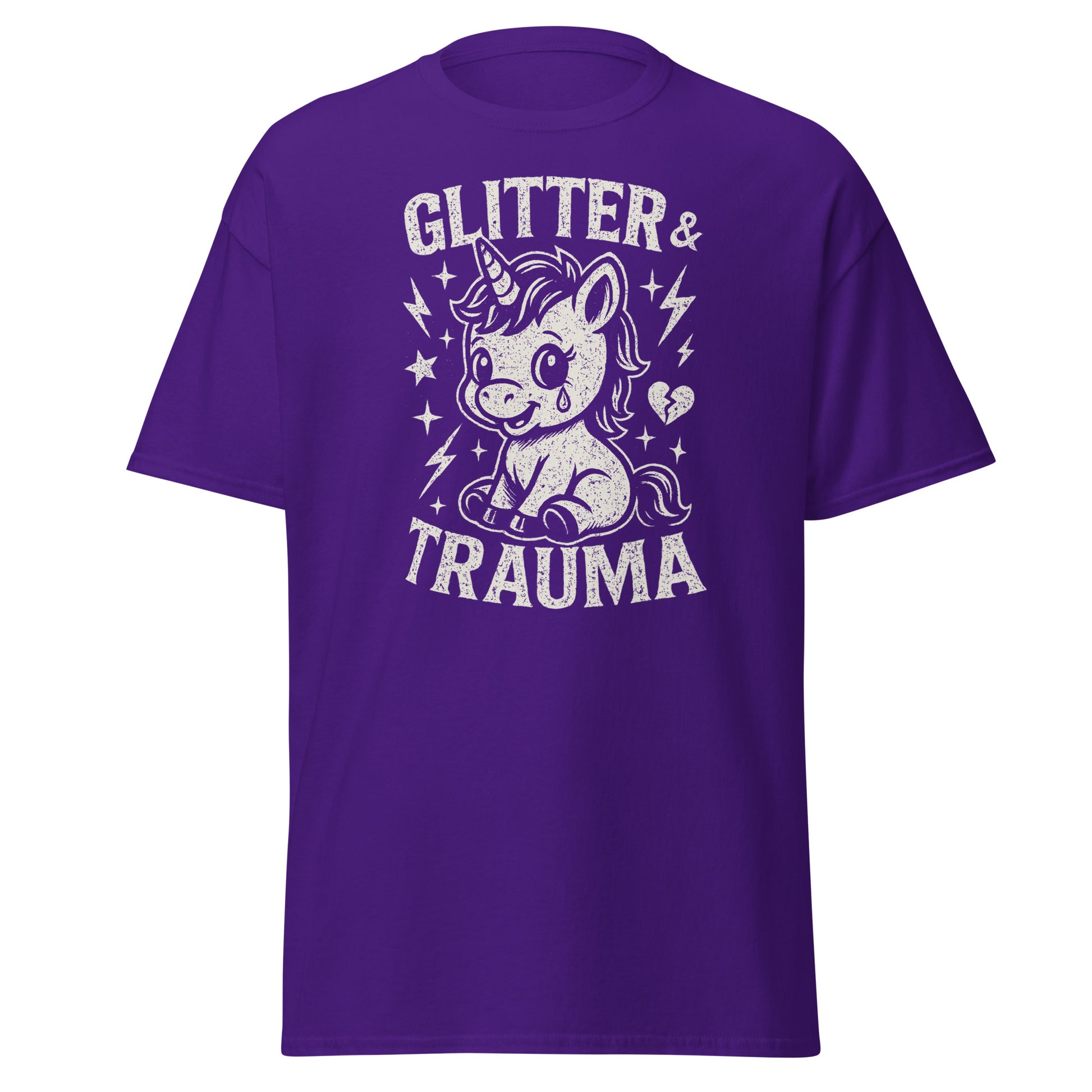 Purple t-shirt with a unicorn graphic and text 'Glitter & Trauma' on a white background