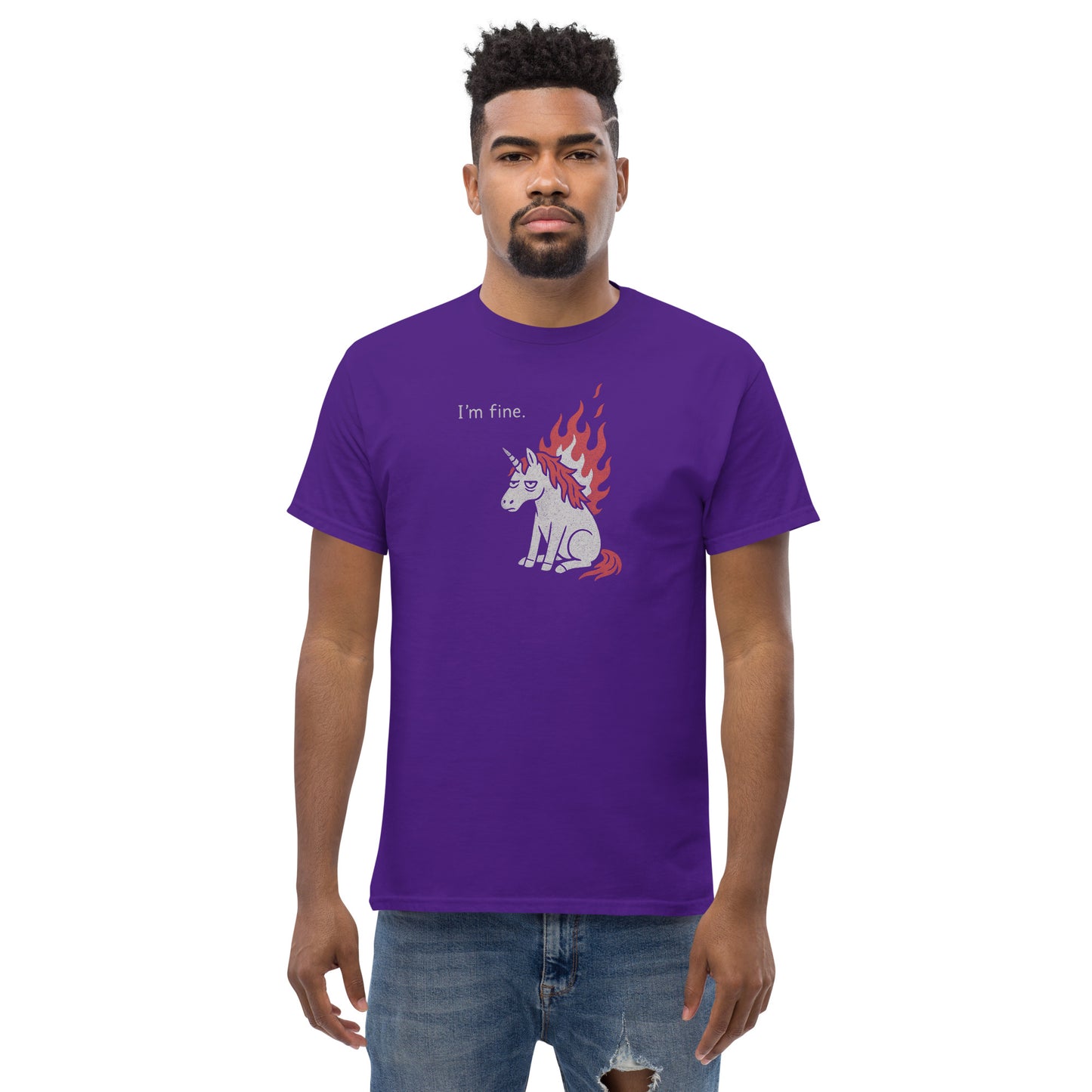 Man wearing a purple t-shirt with a graphic design of a unicorn on fire and 'I'm fine.' text.