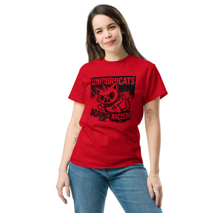 Woman wearing red shirt with a unicorncat and the slogan "Unicorncats against racism"