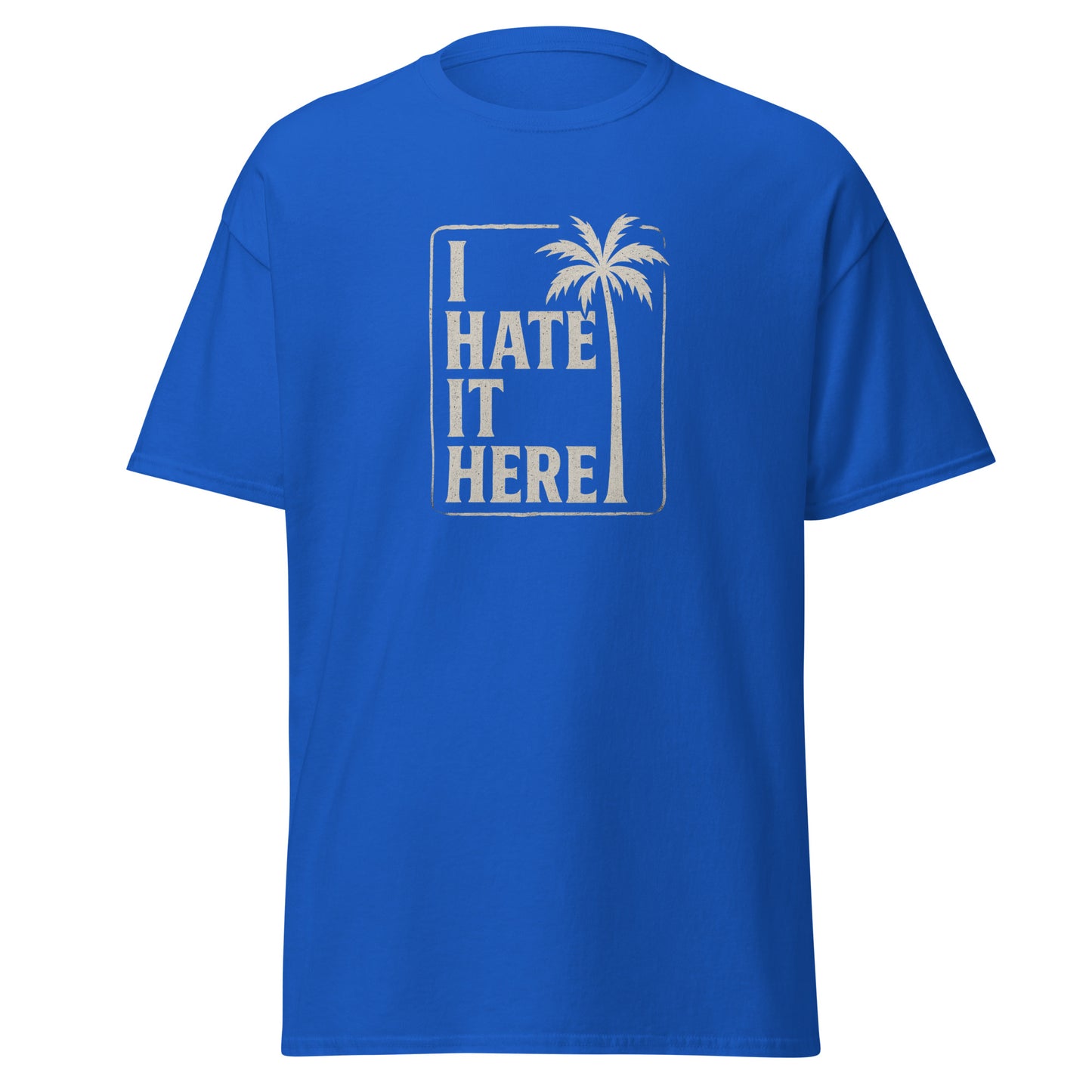 Blue t-shirt with 'I Hate It Here' graphic on a white background