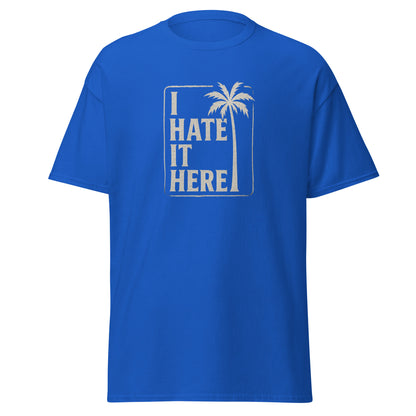 Blue t-shirt with 'I Hate It Here' graphic on a white background