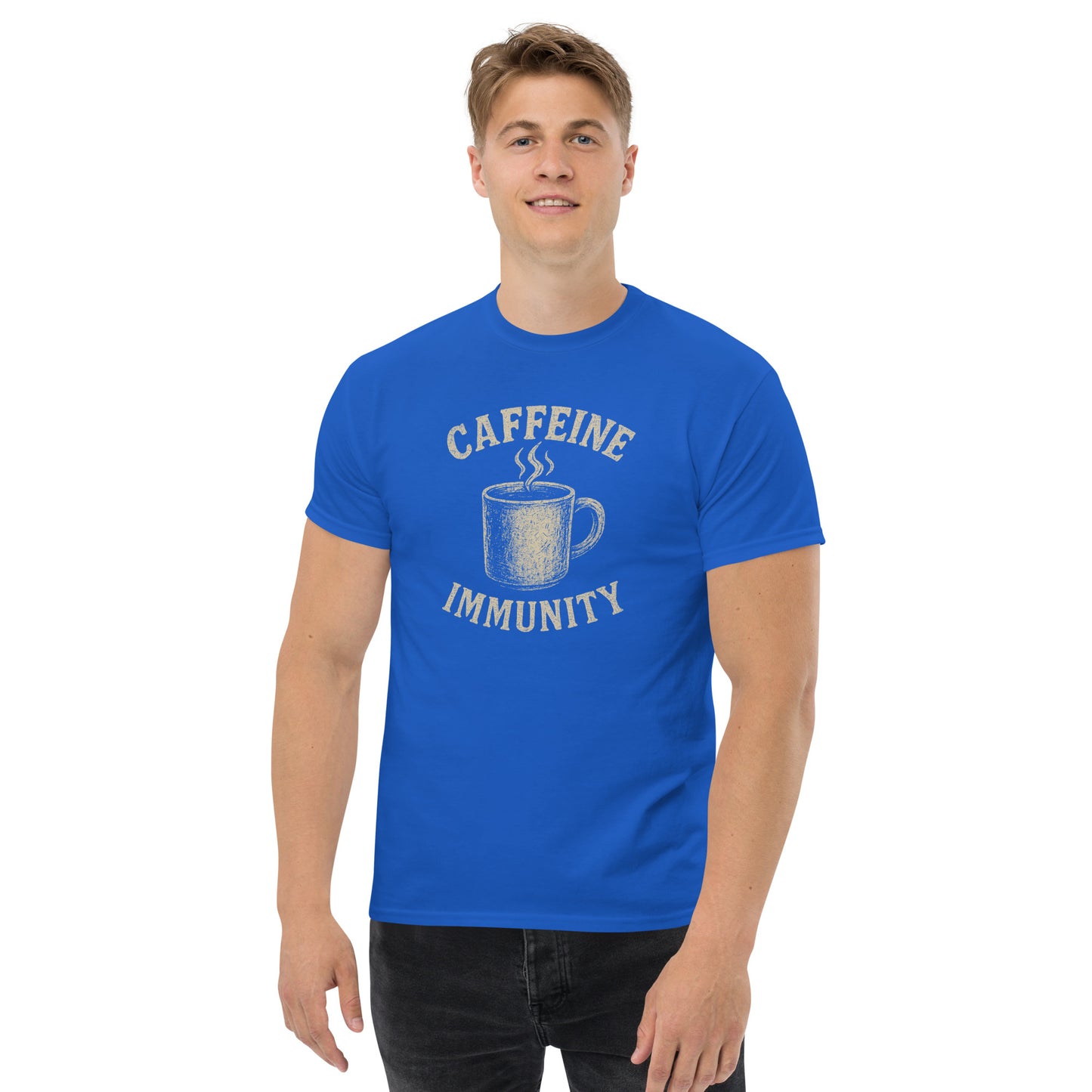 Person wearing a blue t-shirt with 'CAFFEINE IMMUNITY' text and coffee cup graphic on a white background