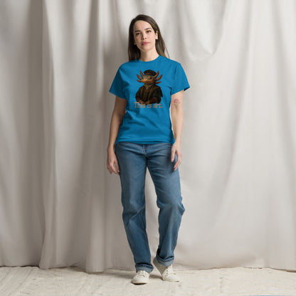 Person wearing a blue t-shirt with a graphic design and text, standing against a plain background