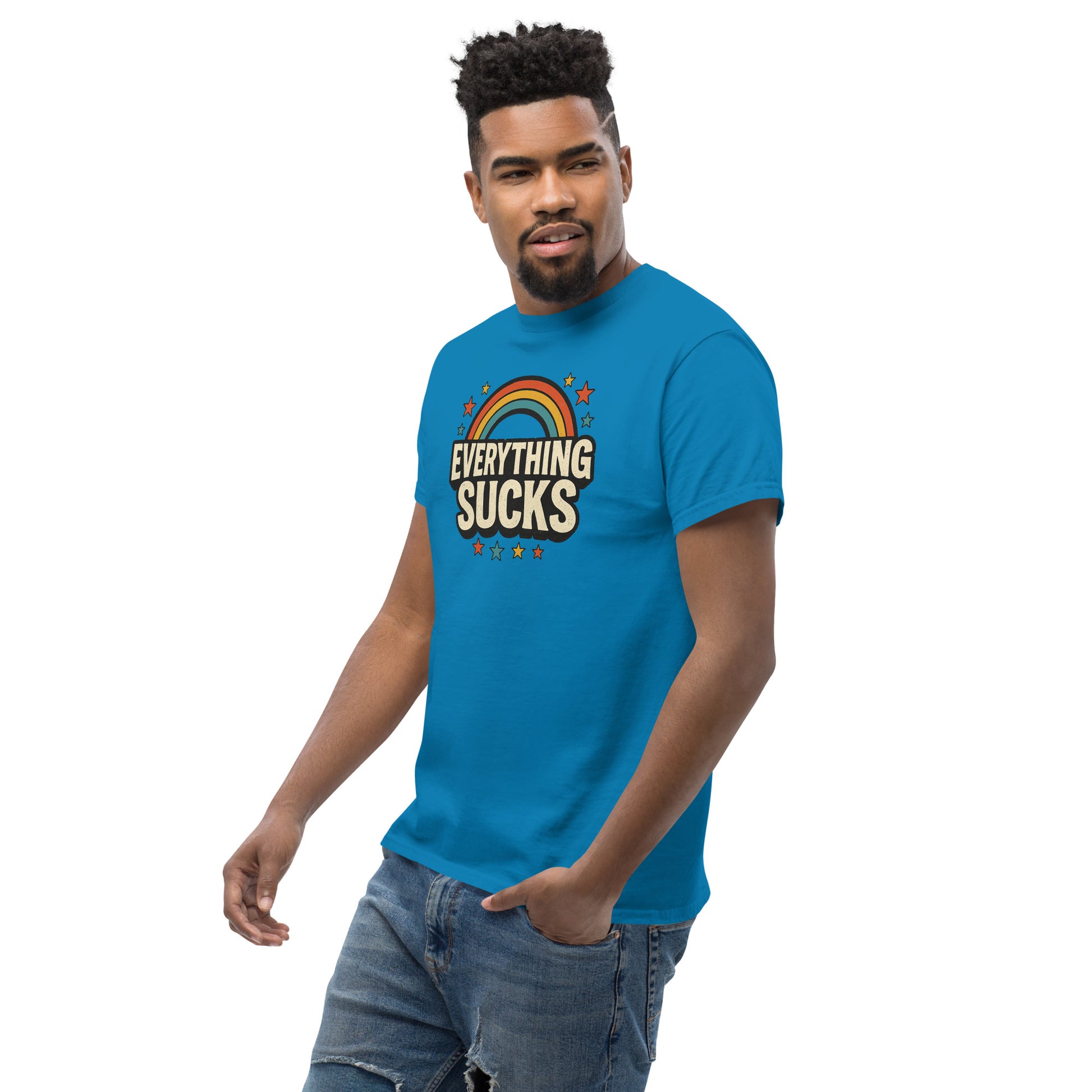 Man wearing a blue t-shirt with 'Everything Sucks' graphic on a white background
