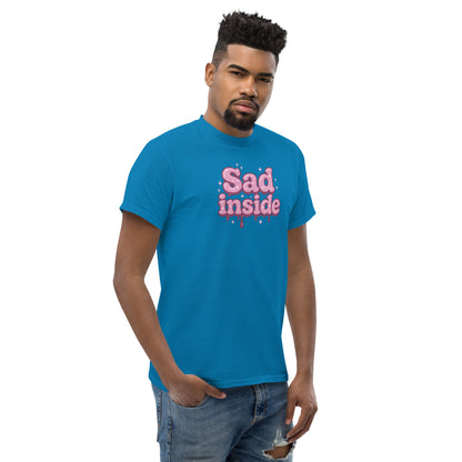 Man wearing a blue t-shirt with 'Sad inside' text on a white background