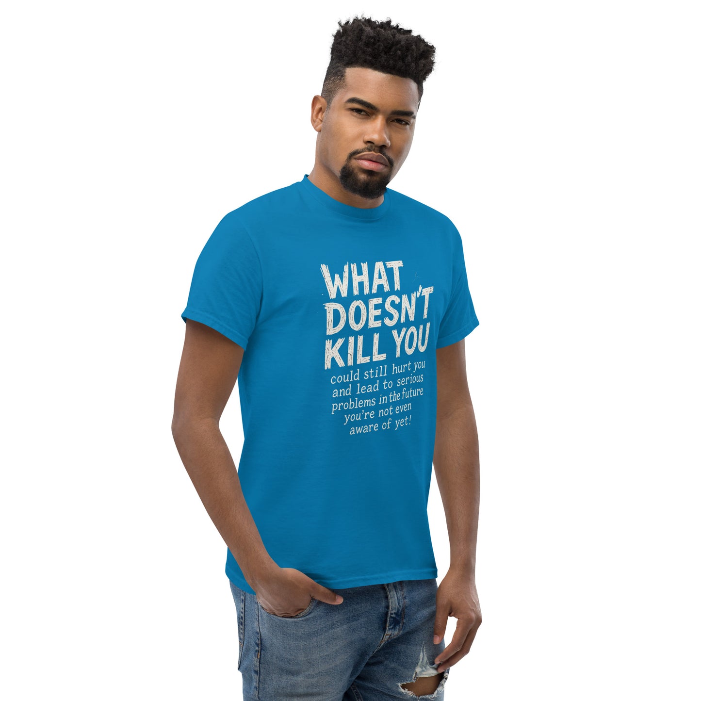 Man wearing a blue t-shirt with text on a white background