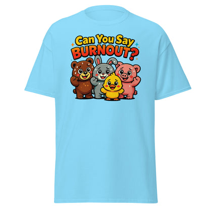 A light blue short-sleeve t-shirt with a colorful graphic on the chest that reads 'Can You Say BURNOUT?' above four cartoon animals (a brown bear, a gray rabbit, a yellow chick, and a pink pig).