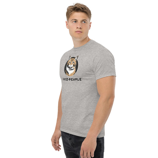 Man wearing a gray t-shirt with a dog graphic and text on a white background
