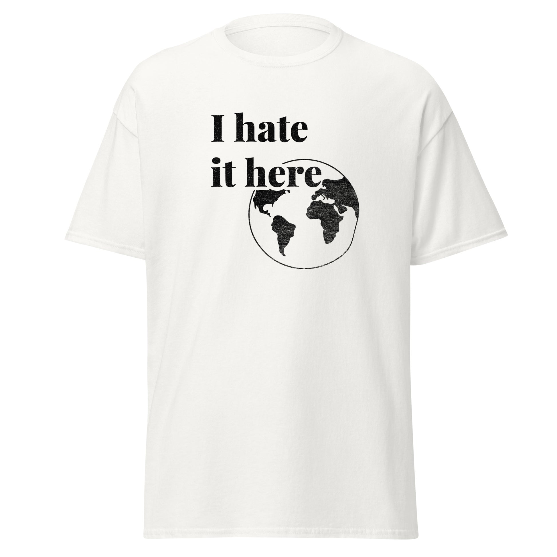 White t-shirt with 'I hate it here' text and world map graphic on a white background