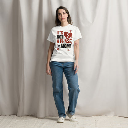 Woman wearing a white t-shirt with a red and black graphic and text, standing against a plain background.