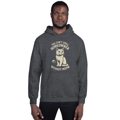 Person wearing a dark gray hoodie with a cat graphic and text on a white background
