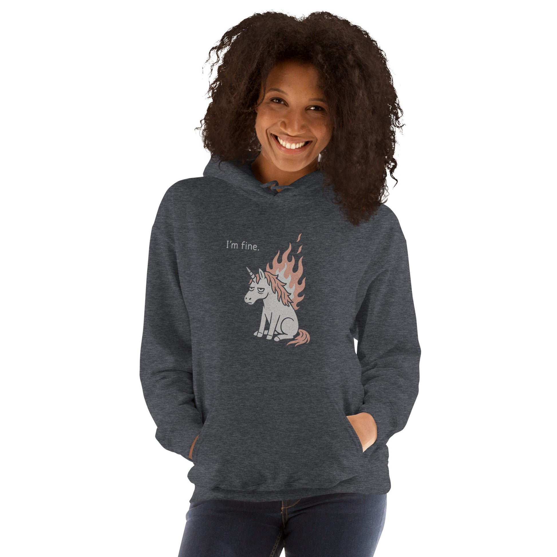 Person wearing a dark gray hoodie with a unicorn design and text on a white background