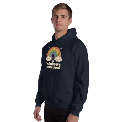 Person wearing a navy hoodie with a rainbow and cloud design on a white background