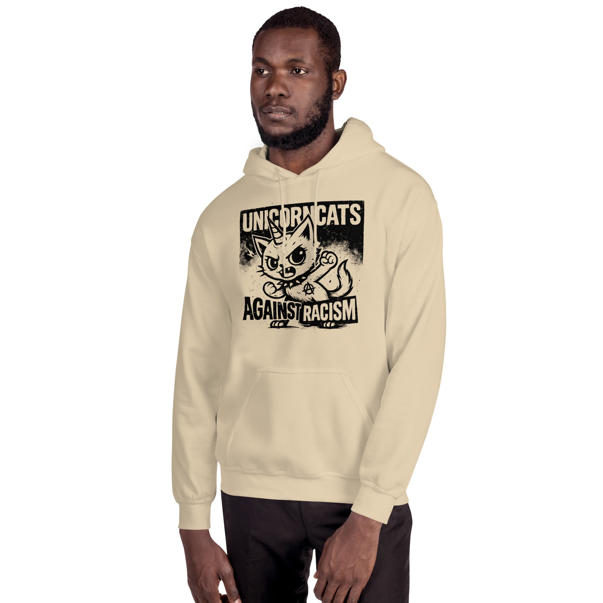 Man wearing beige hoodie with a unicorncat and a text reading "Unicorncats against racism"