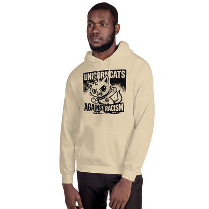 Man wearing beige hoodie with a unicorncat and a text reading "Unicorncats against racism"