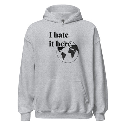 Gray hoodie with 'I hate it here' text and world map design on a white background