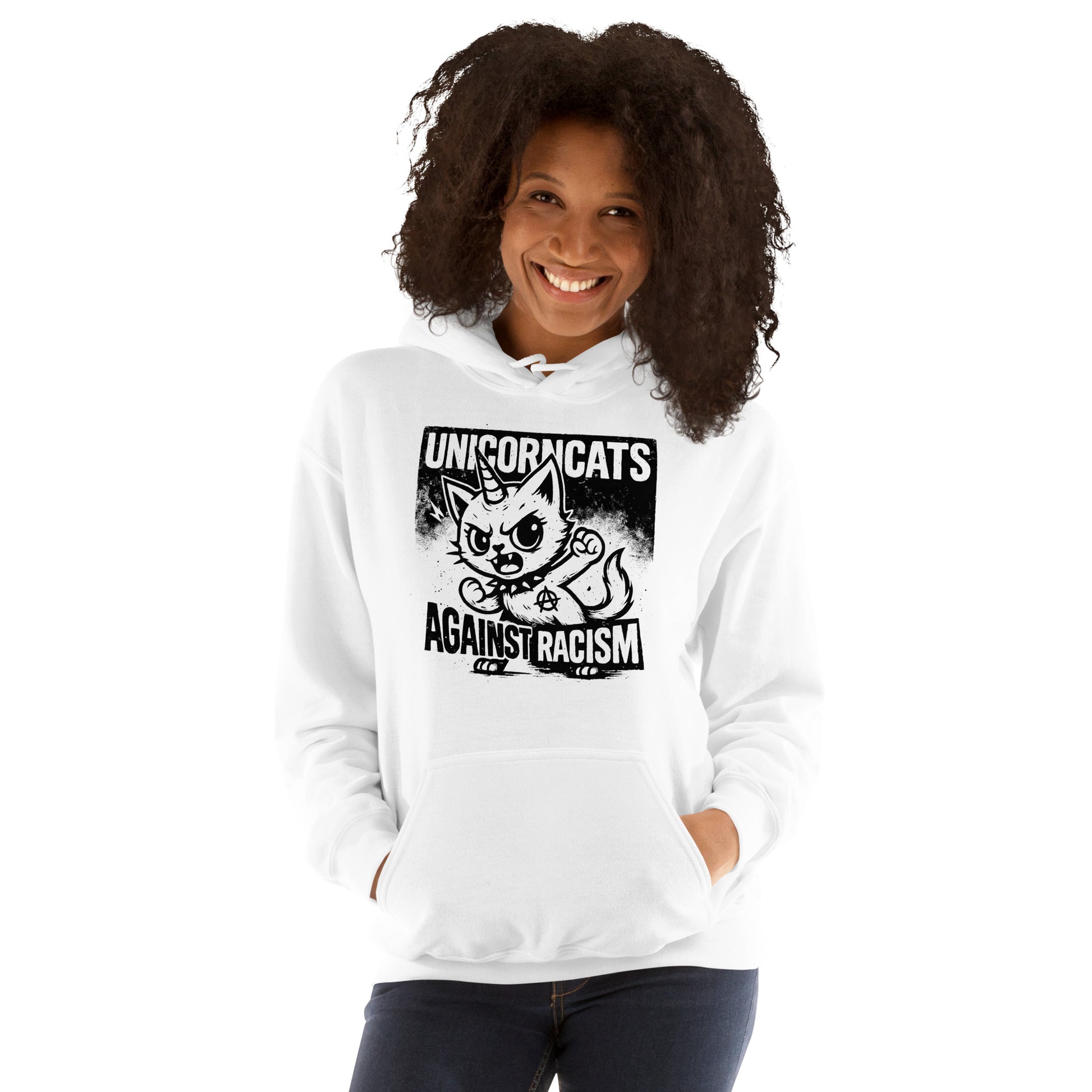 Woman wearing white hoodie with a unicorncat and a text reading "Unicorncats against racism"