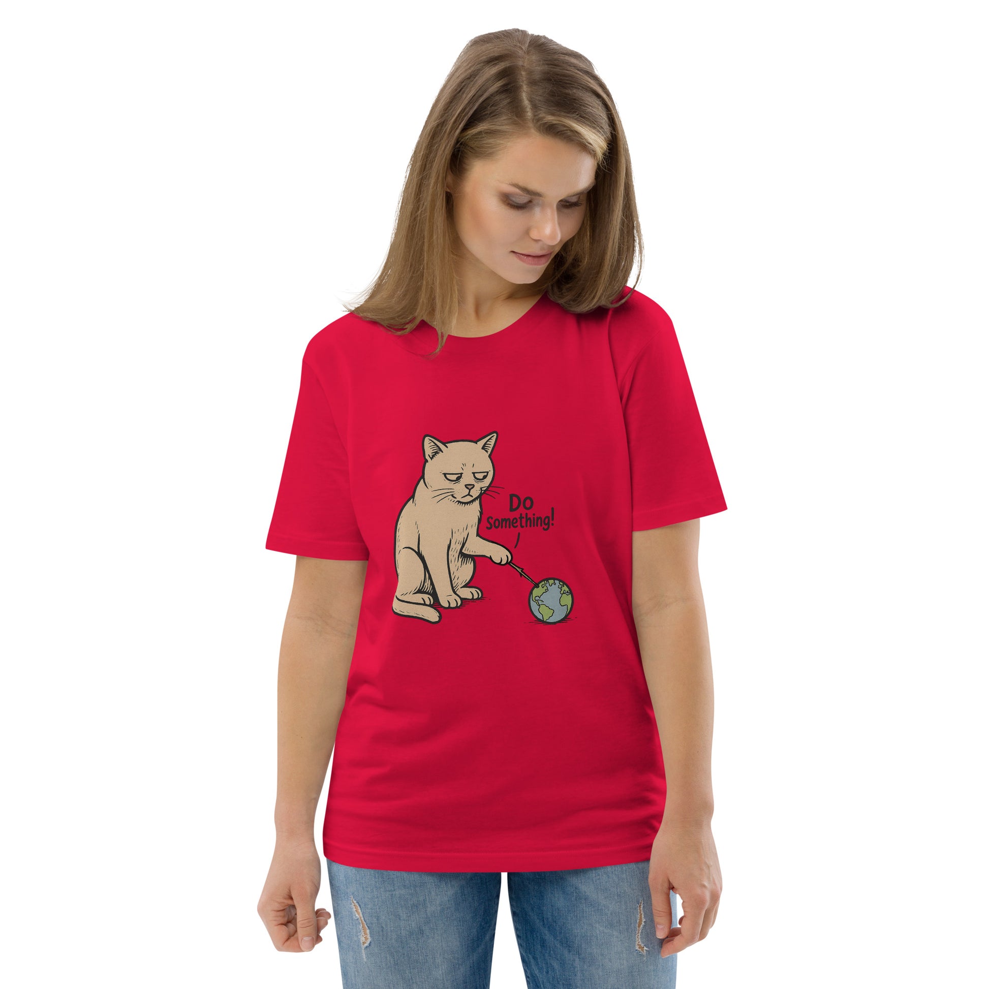 woman waearing red Unisex organic cotton t-shirt with bold slogan Do Something in protest-style graphic