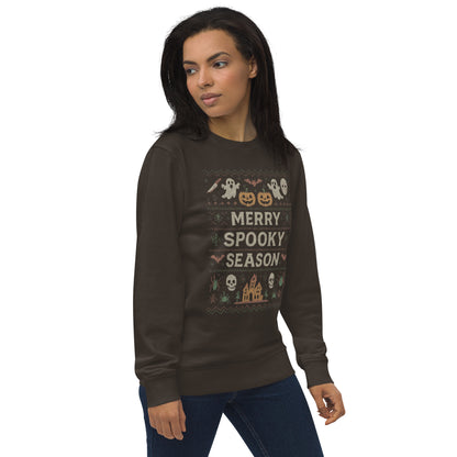 Woman wearing a brown sweatshirt with Halloween-themed design on a white background