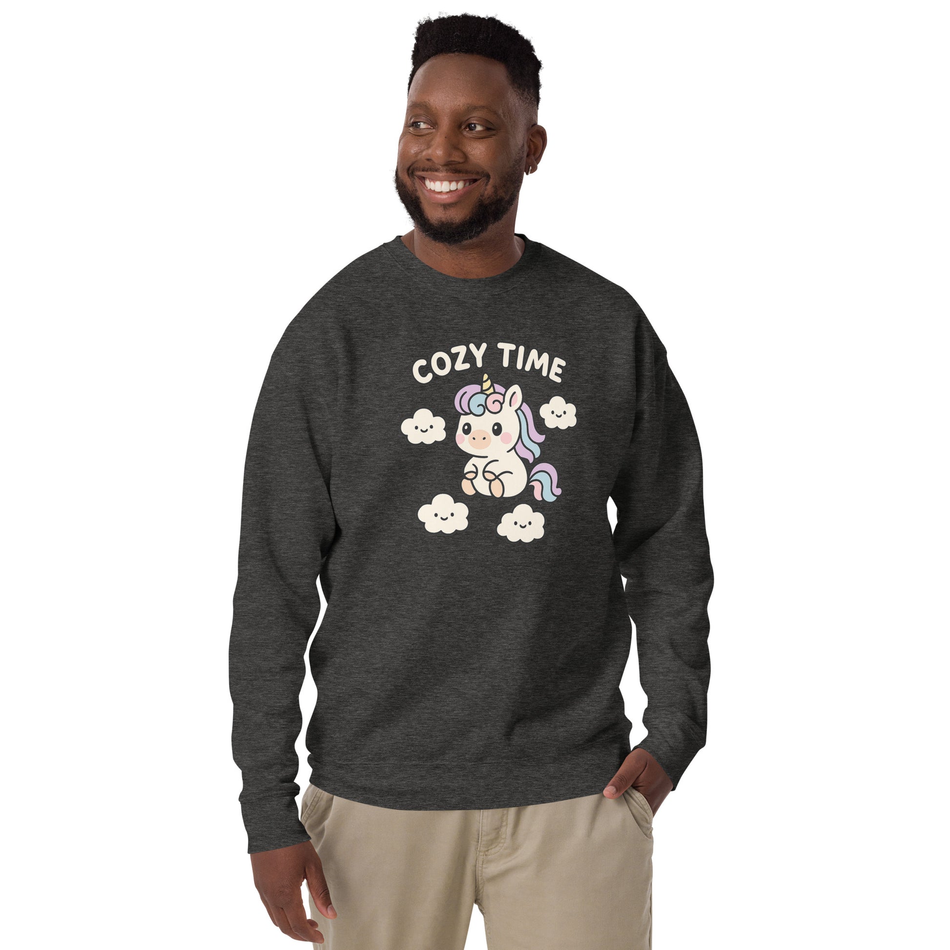 Man wearing a dark gray sweatshirt with a unicorn graphic and 'Cozy Time' text on a white background