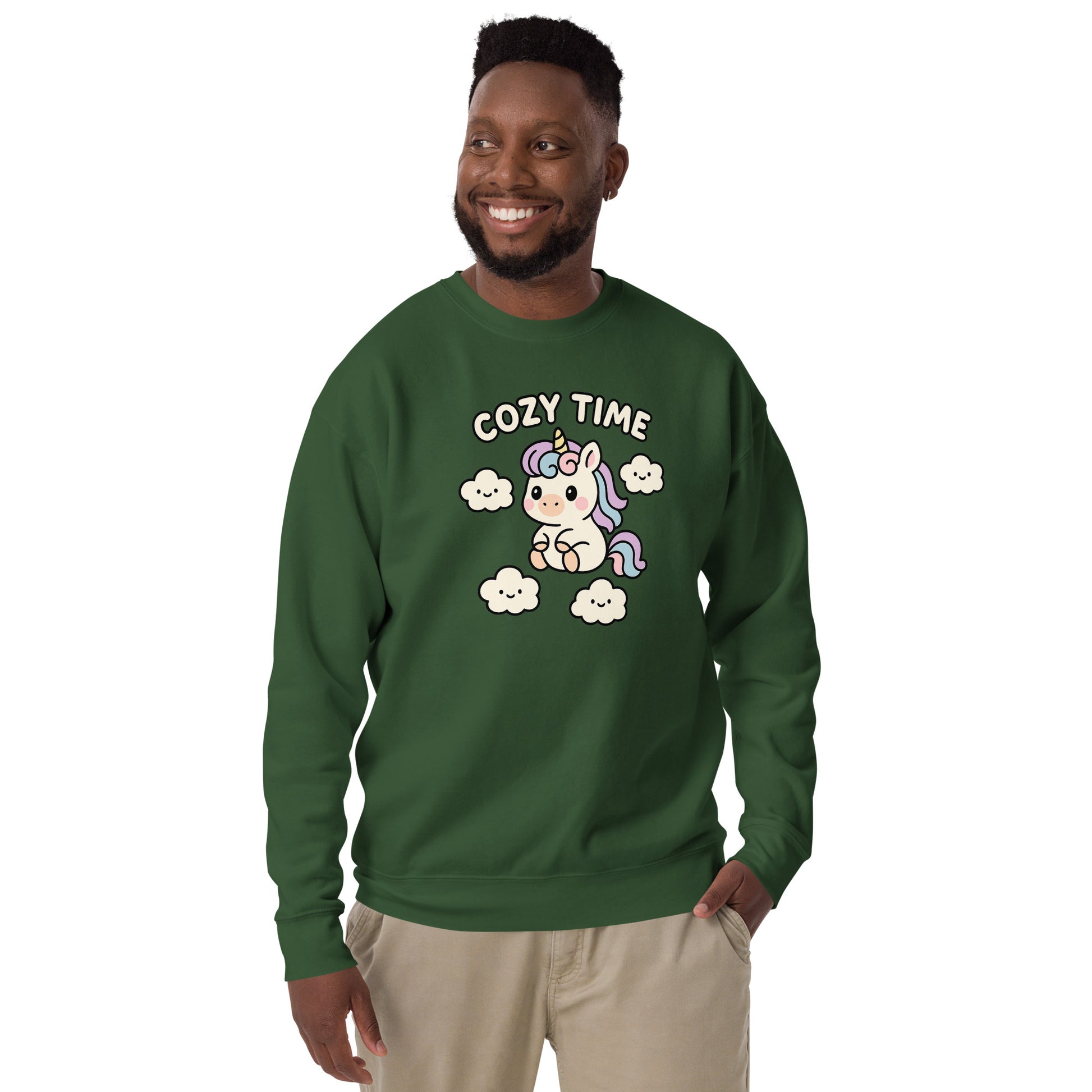 Man wearing a green sweatshirt with a unicorn graphic and 'Cozy Time' text on a white background