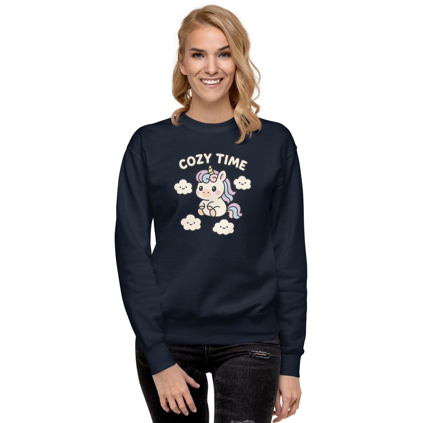 Woman wearing a navy blue sweatshirt with a unicorn graphic and 'Cozy Time' text on a white background
