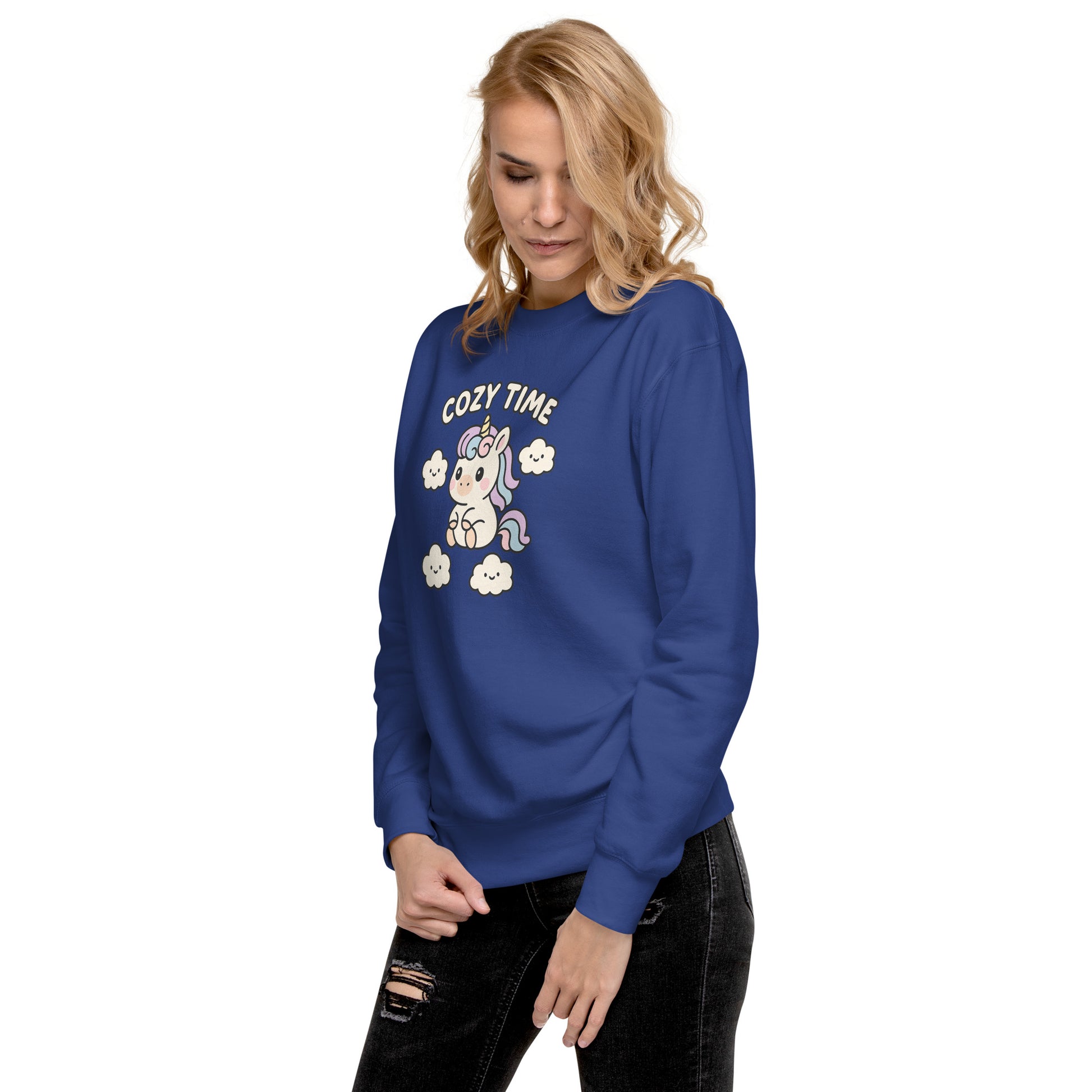 Woman wearing a blue sweatshirt with a graphic design and text on a white background